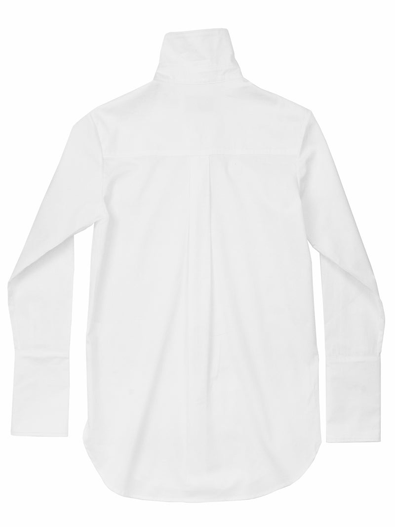 The perfect white shirt. Classic Six Donna White shirt. Season-less, crisp cotton button-down blouse with extra-long cuff, side slits, French seams, grosgrain detailing, and uniquely positioned pearl buttons for ideal fit.